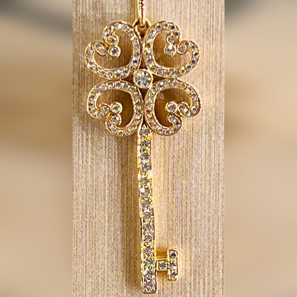 Tiffany and Co. Rose gold diamond key pendant